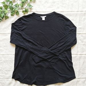 H&M black long-sleeve top.